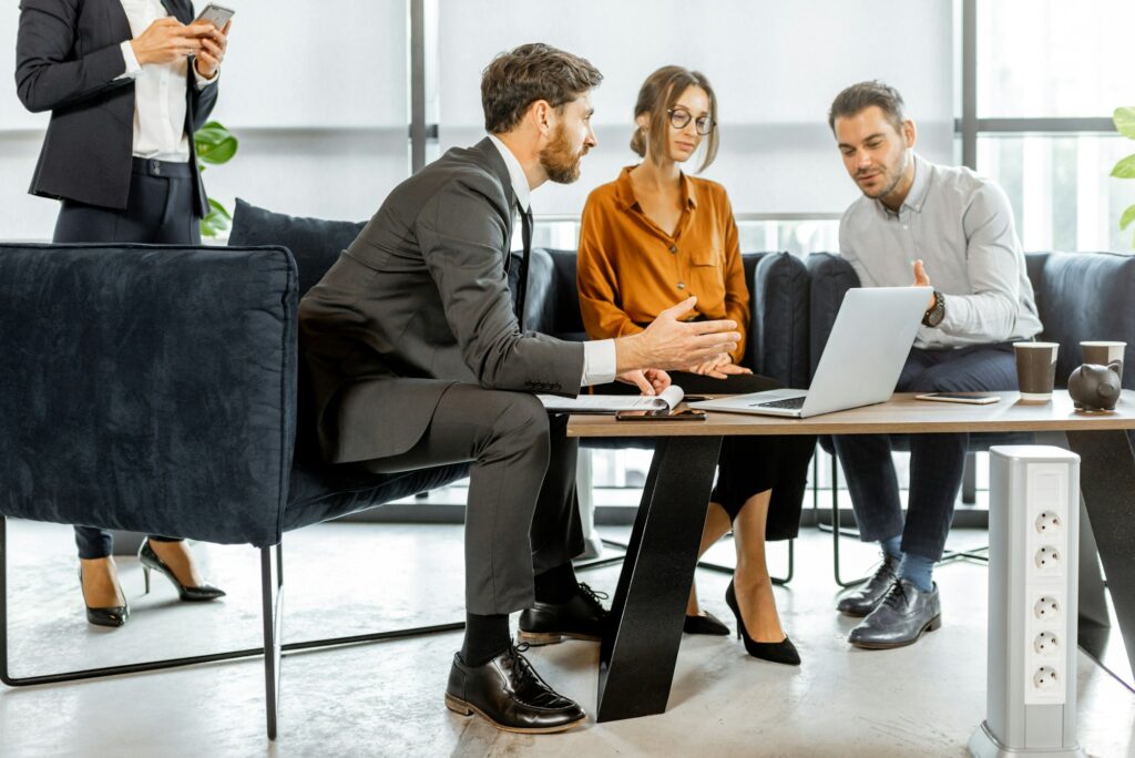 Young couple with financial advisor at the office